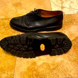 Italian-crafted grain leather lug sole shoes.